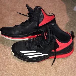 Adidas red and black athletic shoes